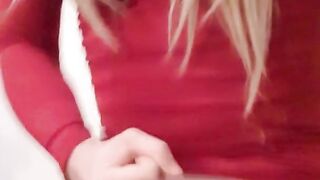 Tugging off in a taut crimson sundress