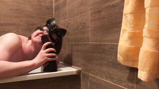 Hooded sissy idolizes BIG BLACK COCK in a douche