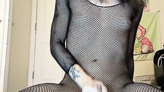 Kinky trans chick in fishnets faps her meatpipe till she shoots a load then eats it up off the floor