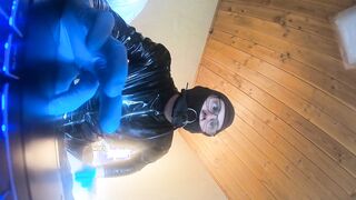 him in a latec catsuit